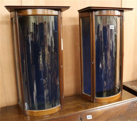 A pair of mahogany bowfronted table top display cabinets H.63cm